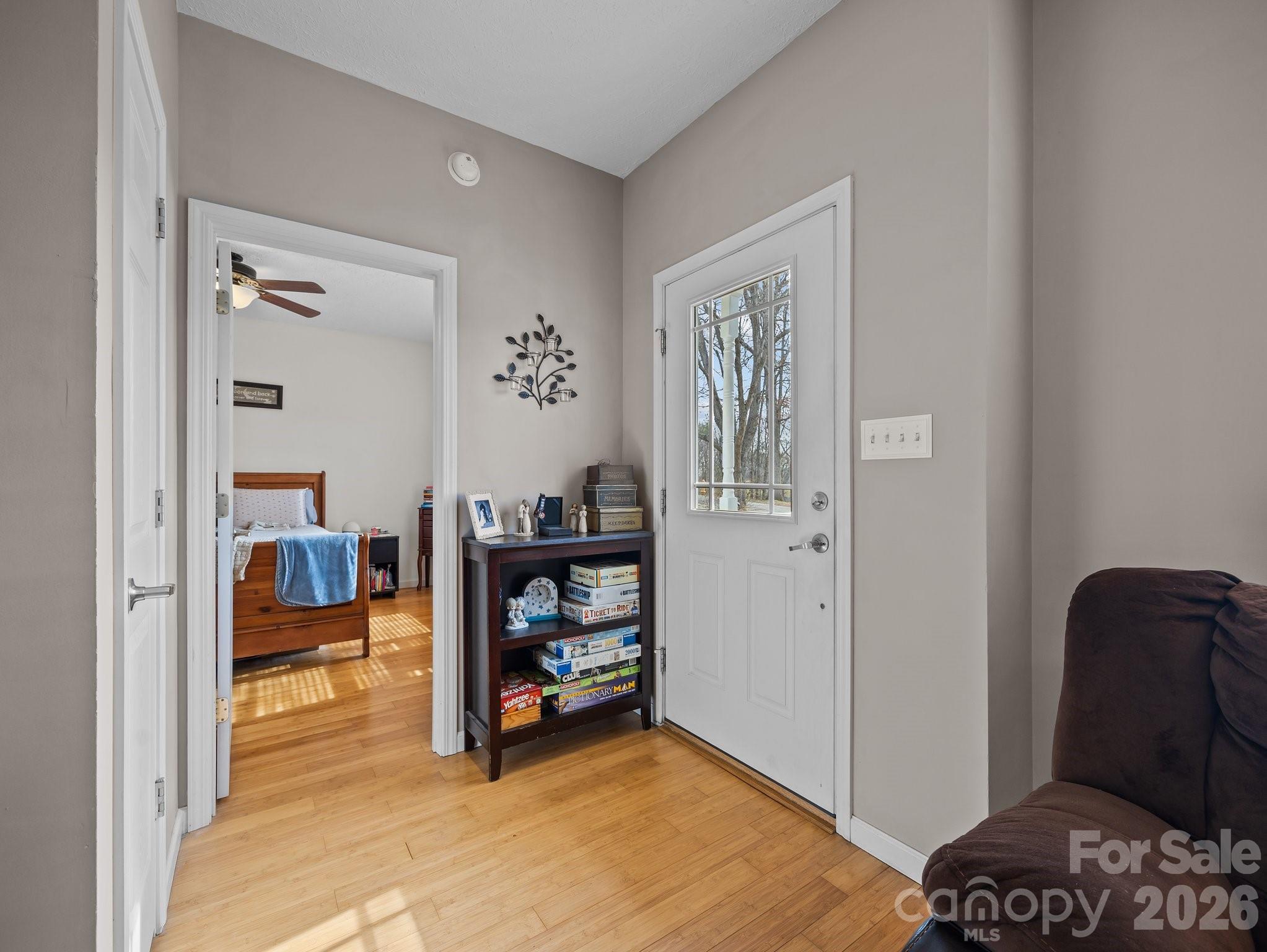 233 Thompson Cv Road Clyde, NC 28721 - Photo 8 of 24 a bedroom with furniture and a window
