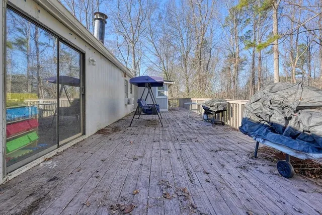 a backyard of a house with seating space