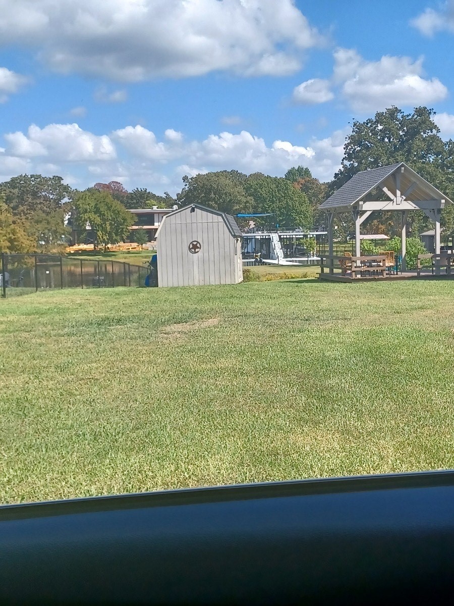 0 Scenic Road Trinidad, TX 75163 - Photo 3 of 7 a view of a big yard next to a lake