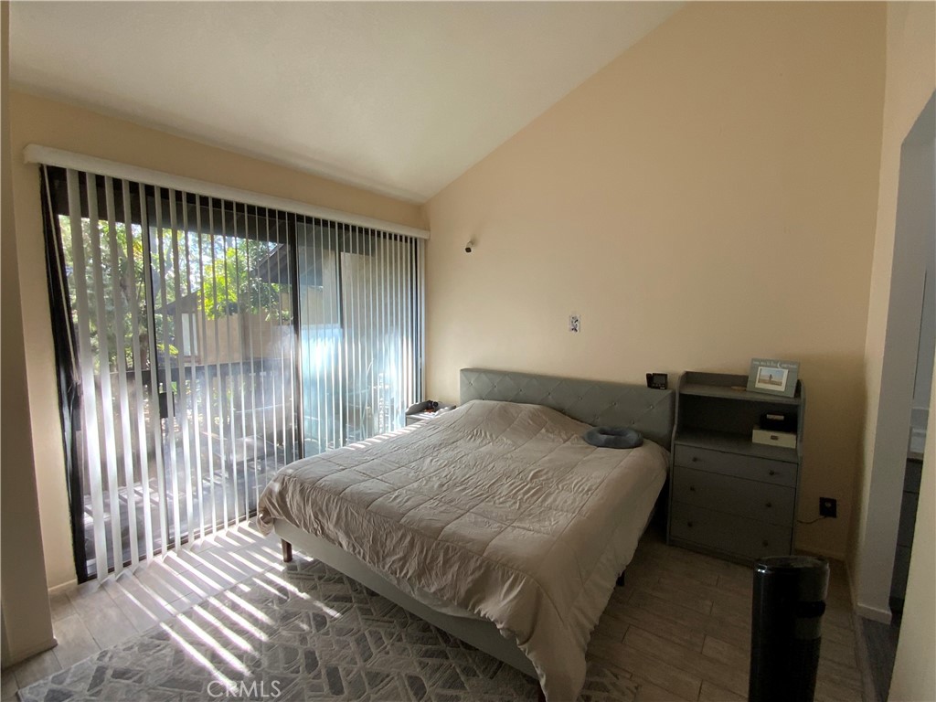 4140 Workman Mill Road, Unit 172 Whittier, CA 90601 - Photo 16 of 21 a bedroom with a bed and a window