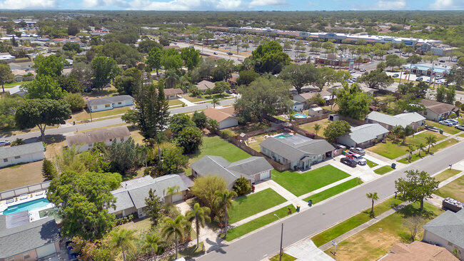 2879 Lancaster Road Melbourne, FL 32935 - Photo 23 of 28 an aerial view of residential houses with outdoor space