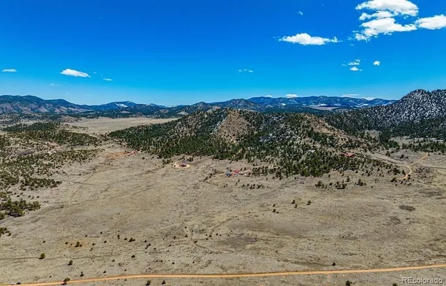a view of mountain with sunset view