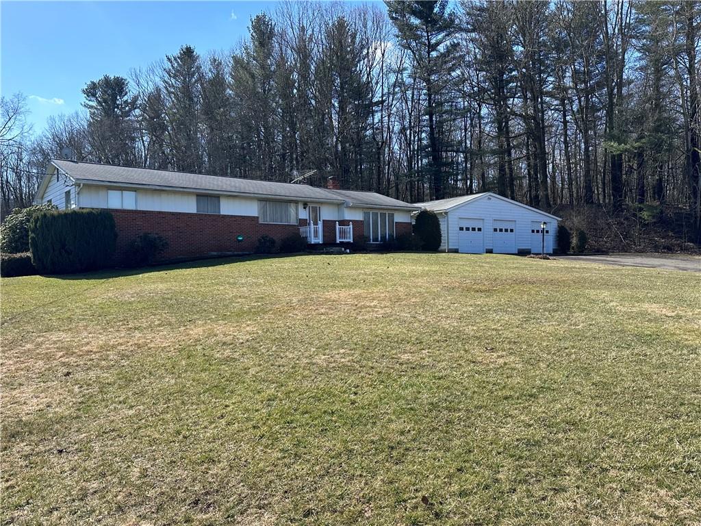 978 Pollock Store Road Slippery Rock, PA 16057 - Photo 1 of 25 a front view of a house with a yard