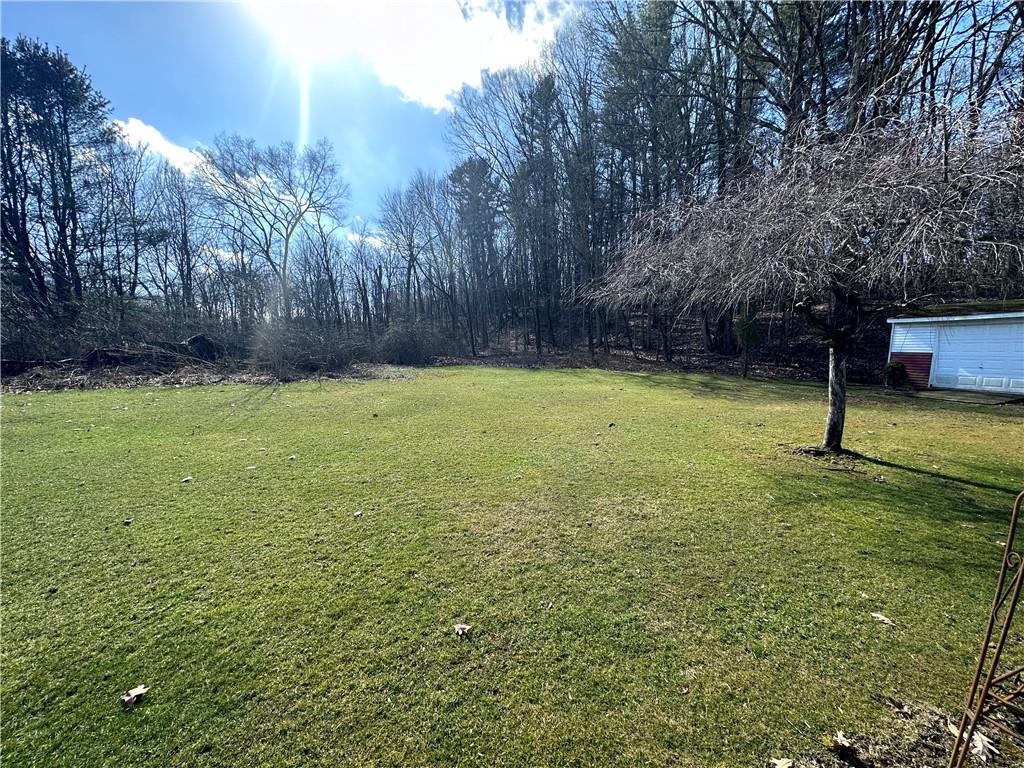978 Pollock Store Road Slippery Rock, PA 16057 - Photo 17 of 25 a view of a yard with a tree
