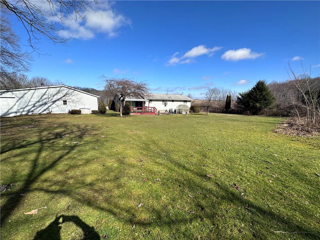 978 Pollock Store Road Slippery Rock, PA 16057 - Photo 20 of 25 a view of a big yard with an outdoor space