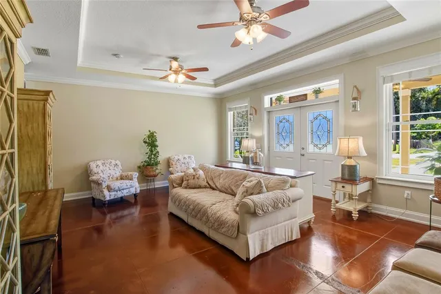 a view of a dining room with furniture window and outside view