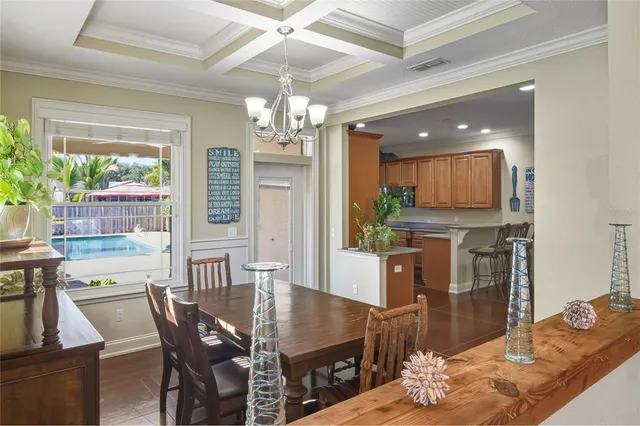 a kitchen with granite countertop a sink and a window