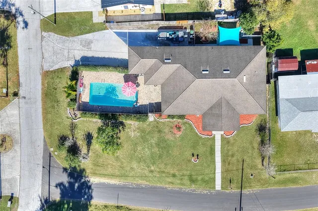 a aerial view of a house with a garden