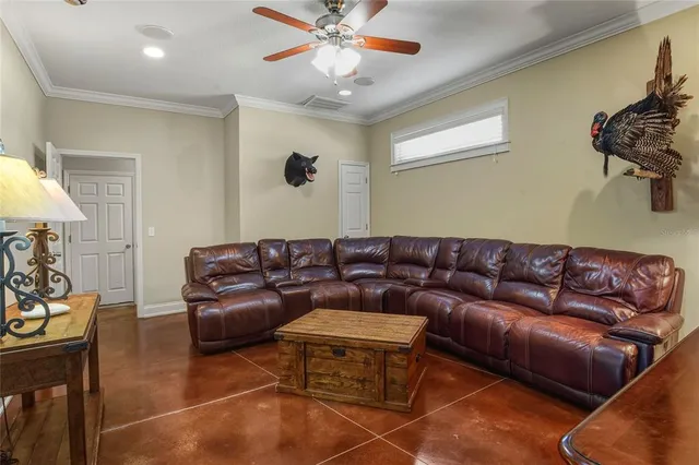 a bed room with a bed and a television