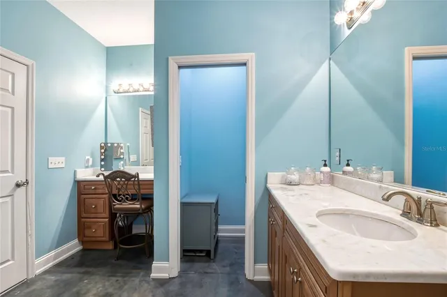 a bedroom with a bed and a cabinets