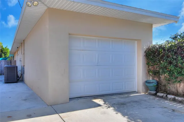 an aerial view of a city with ocean view