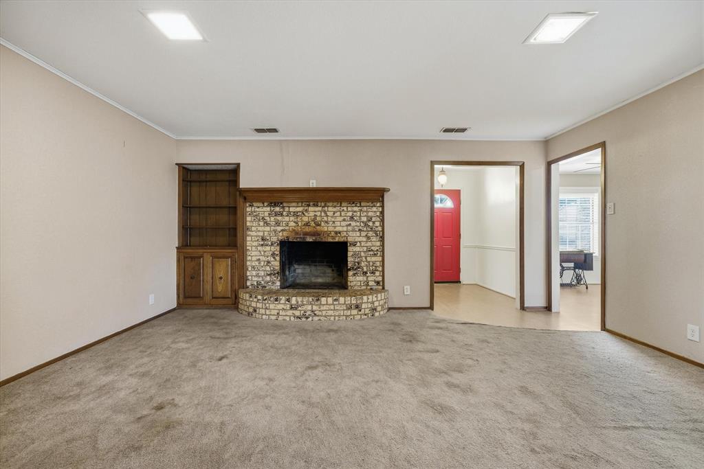 216 Helen Drive Lindale, TX 75771 - Photo 14 of 39 an empty room with fireplace