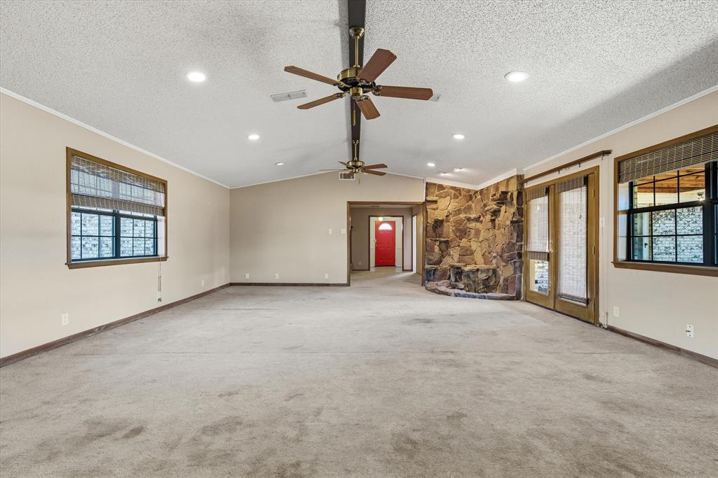 216 Helen Drive Lindale, TX 75771 - Photo 16 of 39 a view of a livingroom with a ceiling fan and window