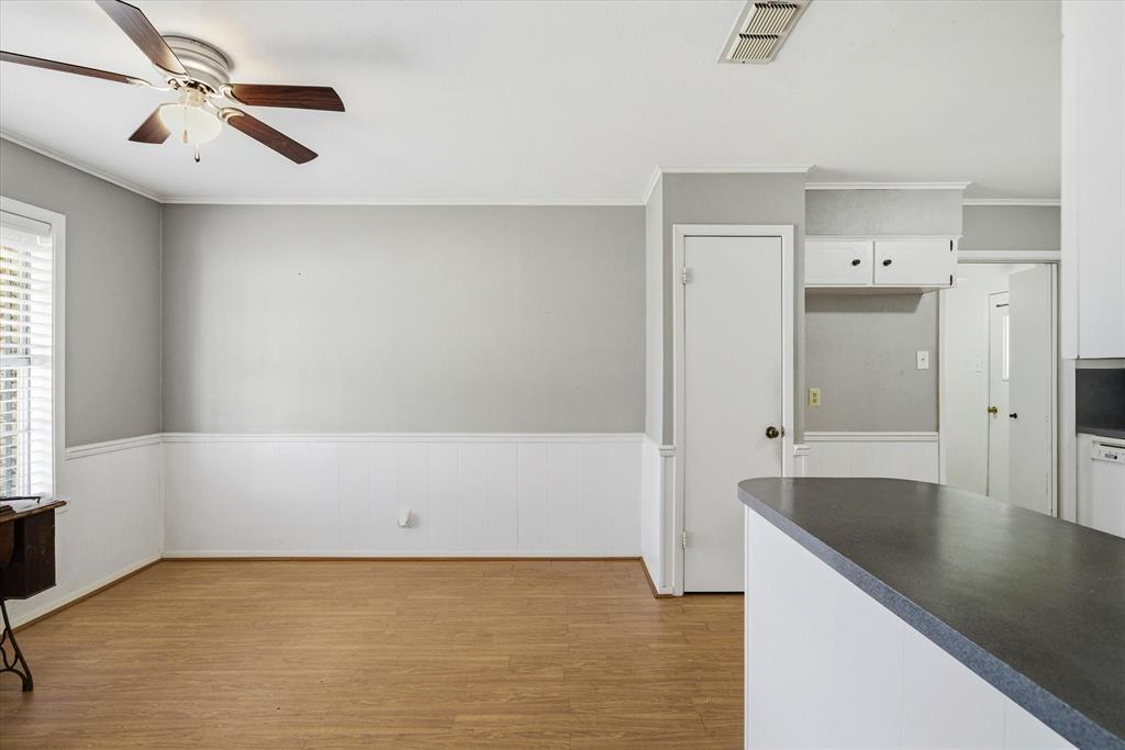 216 Helen Drive Lindale, TX 75771 - Photo 5 of 39 an empty room with a window and a chandelier