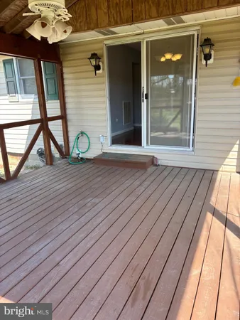 a view of a balcony with a door