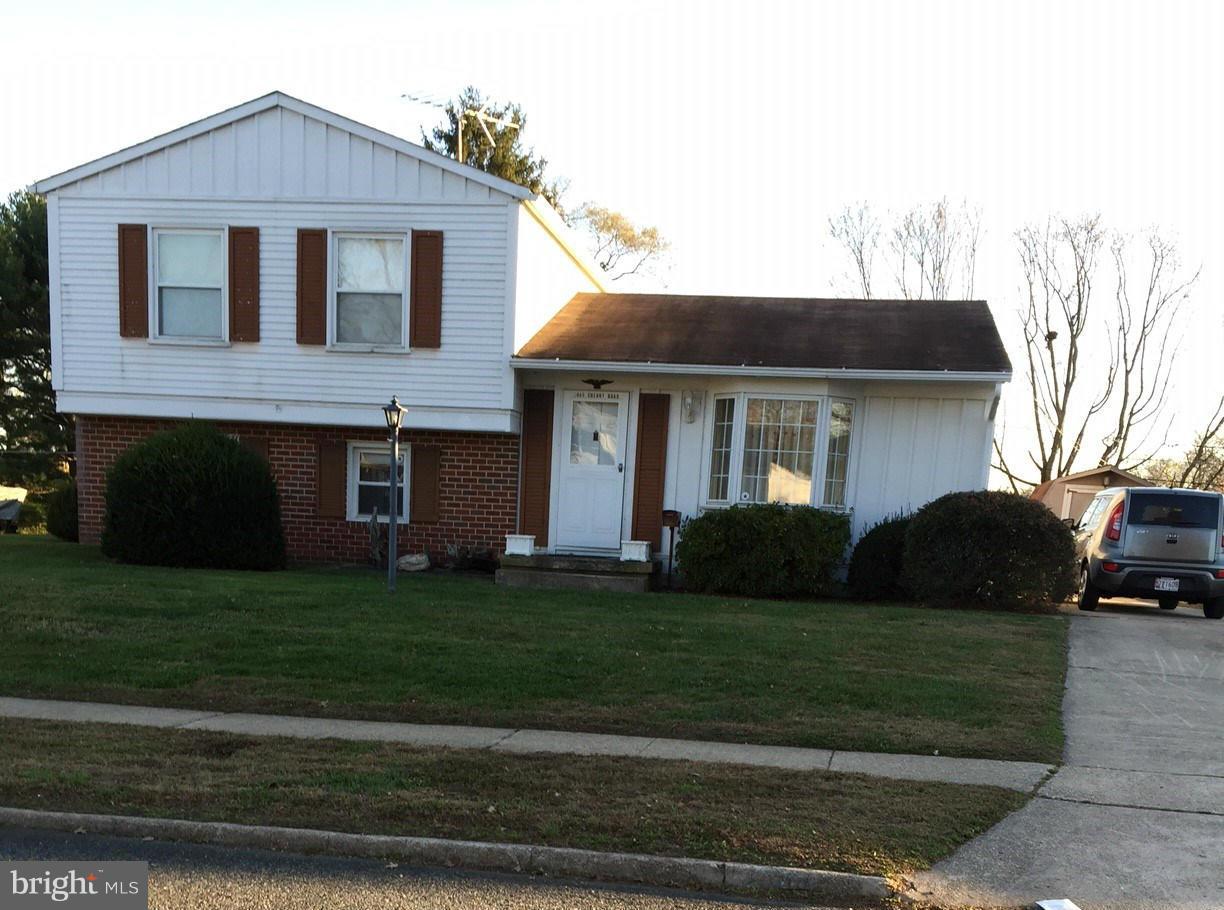 2009 Cherry Road Edgewood, MD 21040 - Photo 2 of 30 a front view of a house with a garden
