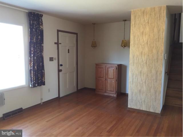 2009 Cherry Road Edgewood, MD 21040 - Photo 12 of 30 a view of an empty room with wooden floor and a window