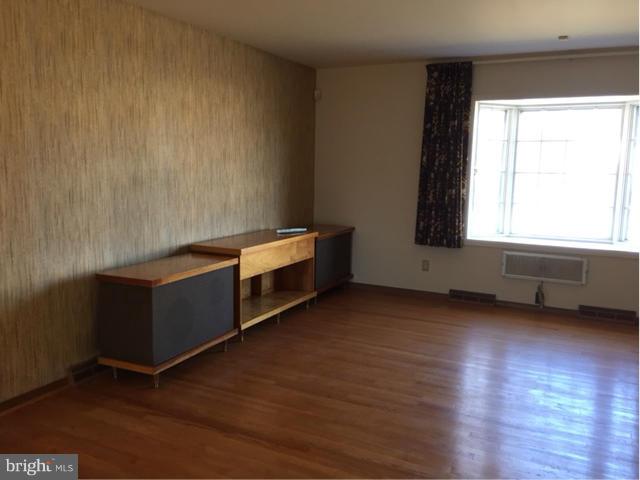 2009 Cherry Road Edgewood, MD 21040 - Photo 13 of 30 a view of an empty room with wooden floor and a window