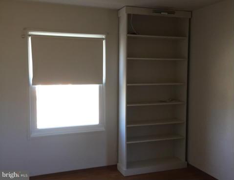 2009 Cherry Road Edgewood, MD 21040 - Photo 15 of 30 a view of walk in closet with empty racks