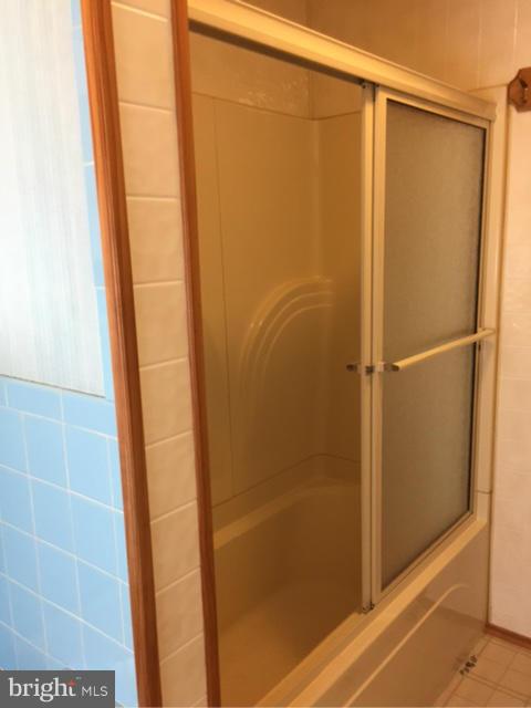 2009 Cherry Road Edgewood, MD 21040 - Photo 21 of 30 a bathroom with a glass door shower and a sink