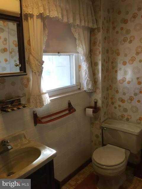 2009 Cherry Road Edgewood, MD 21040 - Photo 27 of 30 a bathroom with a sink and a toilet
