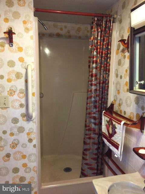 2009 Cherry Road Edgewood, MD 21040 - Photo 28 of 30 a bathroom with a bathtub and shower