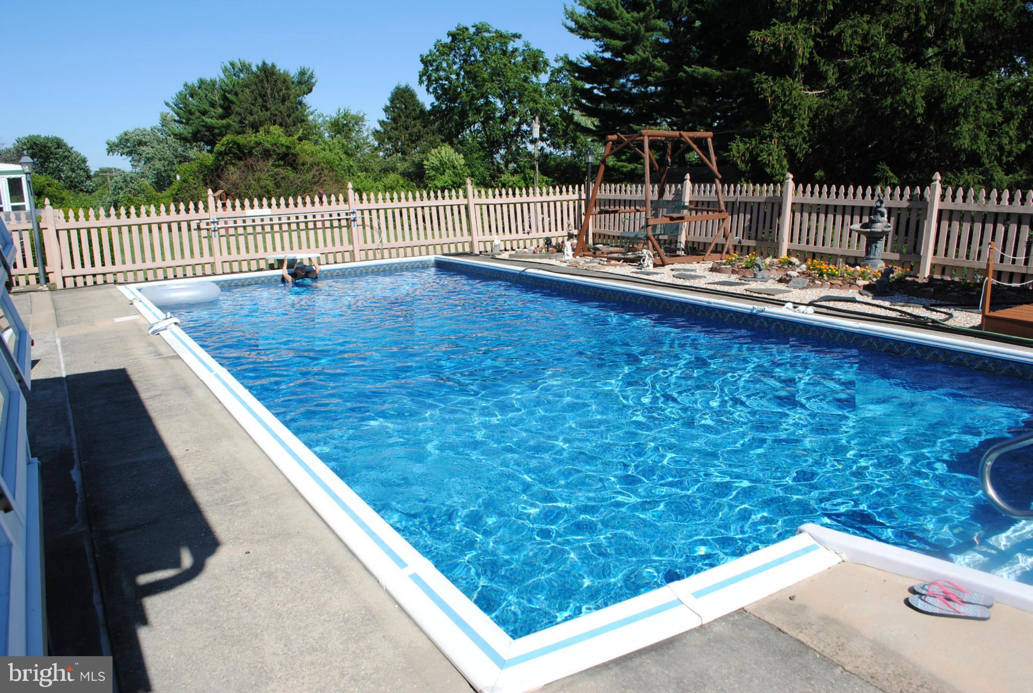 2009 Cherry Road Edgewood, MD 21040 - Photo 5 of 30 a view of a swimming pool with a lounge chair