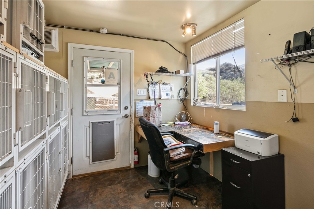28274 San Martinez Grande Canyon Road Castaic, CA 91384 - Photo 47 of 48 a view of a workspace with furniture and a window