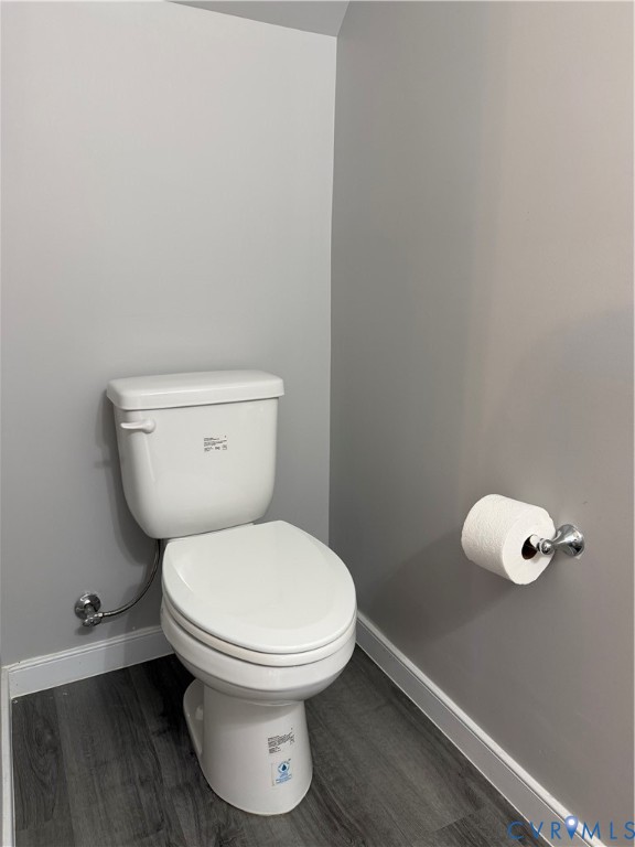 1944 Kennington Park Road Aylett, VA 23009 - Photo 7 of 24 Downstairs Half bathroom with dark wood-finish fl