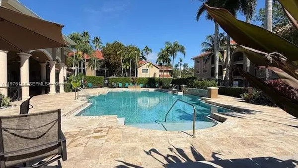 a view of a house with swimming pool