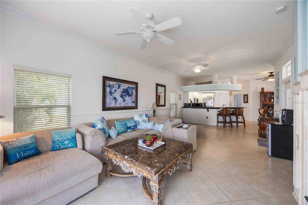48 Bunker Road Rotonda West, FL 33947 - Photo 16 of 59 a living room with furniture and a window
