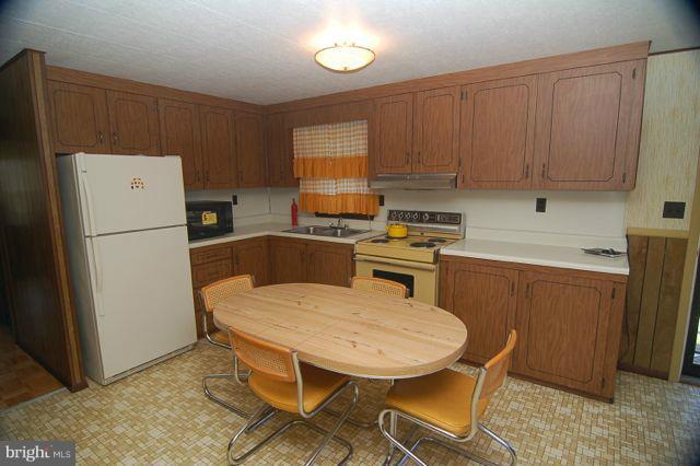 10230 Big Stone Road Millington, MD 21651 - Photo 4 of 8 Large Kitchen with Table Space