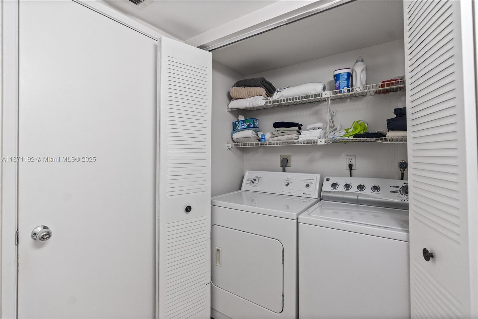 3600 Mystic Pointe Drive, Unit 215 Aventura, FL 33180 - Photo 19 of 49 a view of washer and dryer