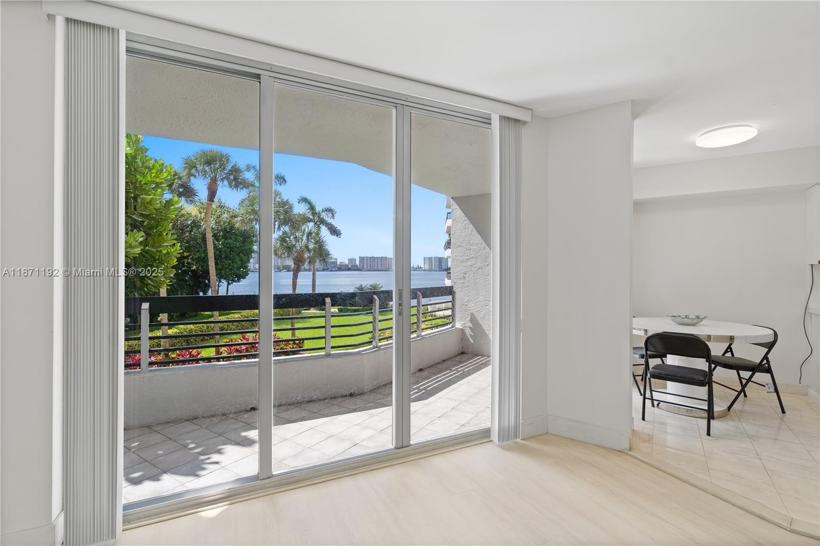 3600 Mystic Pointe Drive, Unit 215 Aventura, FL 33180 - Photo 3 of 49 a view of a room with gym equipment
