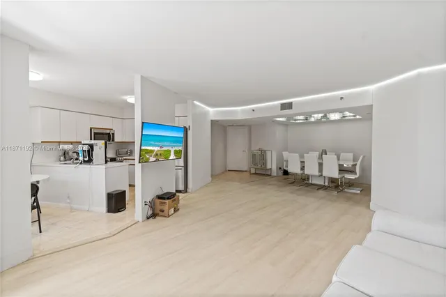 a room with a chair and gym equipment