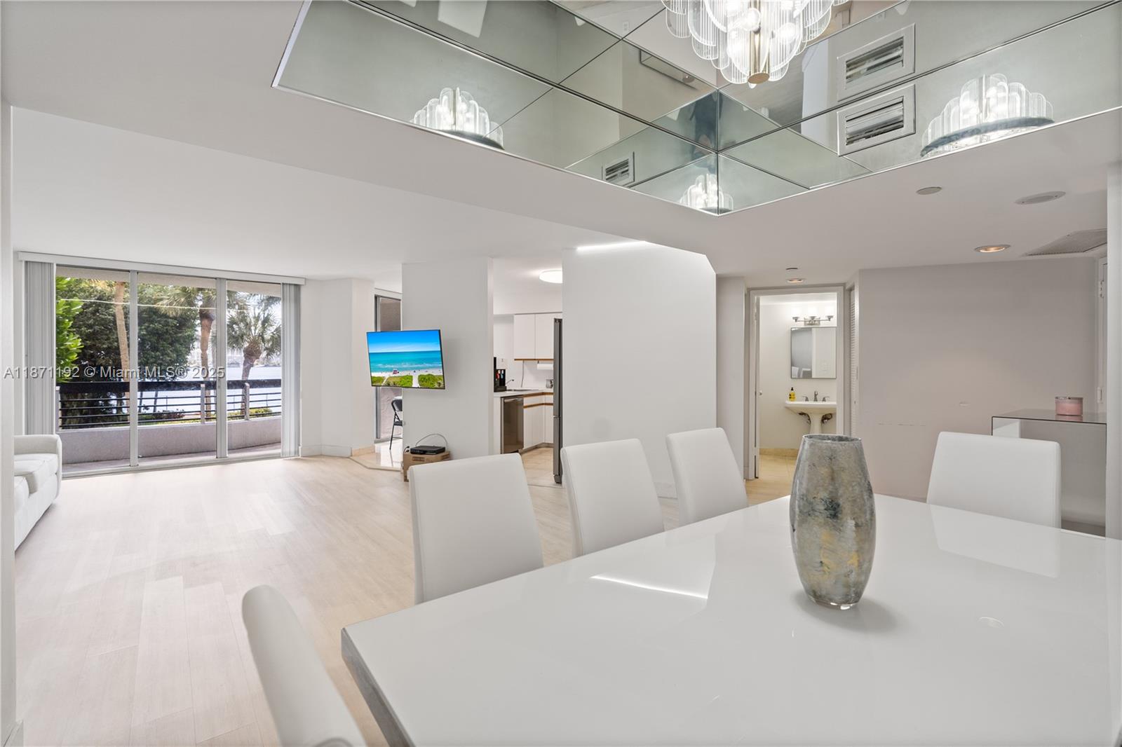 3600 Mystic Pointe Drive, Unit 215 Aventura, FL 33180 - Photo 9 of 49 a living room with furniture