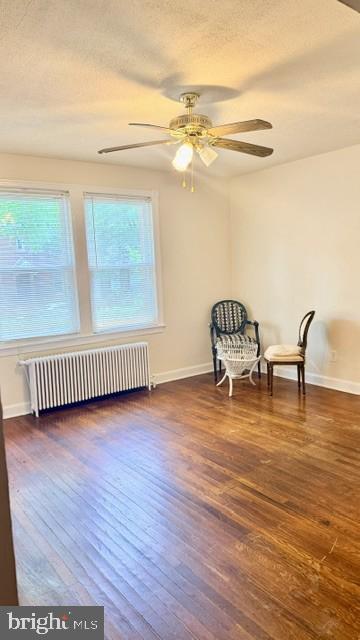 1424 Staples Street Northeast, Unit 1 Washington, DC 20002 - Photo 2 of 8 a view of a room with wooden floor fan and windows
