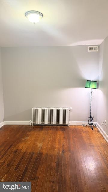 1424 Staples Street Northeast, Unit 1 Washington, DC 20002 - Photo 6 of 8 a view of a room with wooden floor