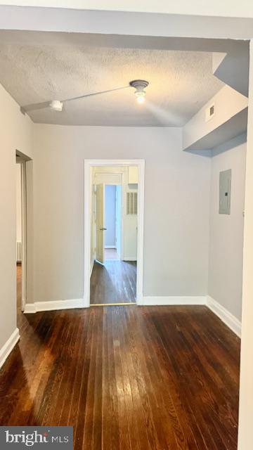 1424 Staples Street Northeast, Unit 1 Washington, DC 20002 - Photo 7 of 8 wooden floor in an empty room
