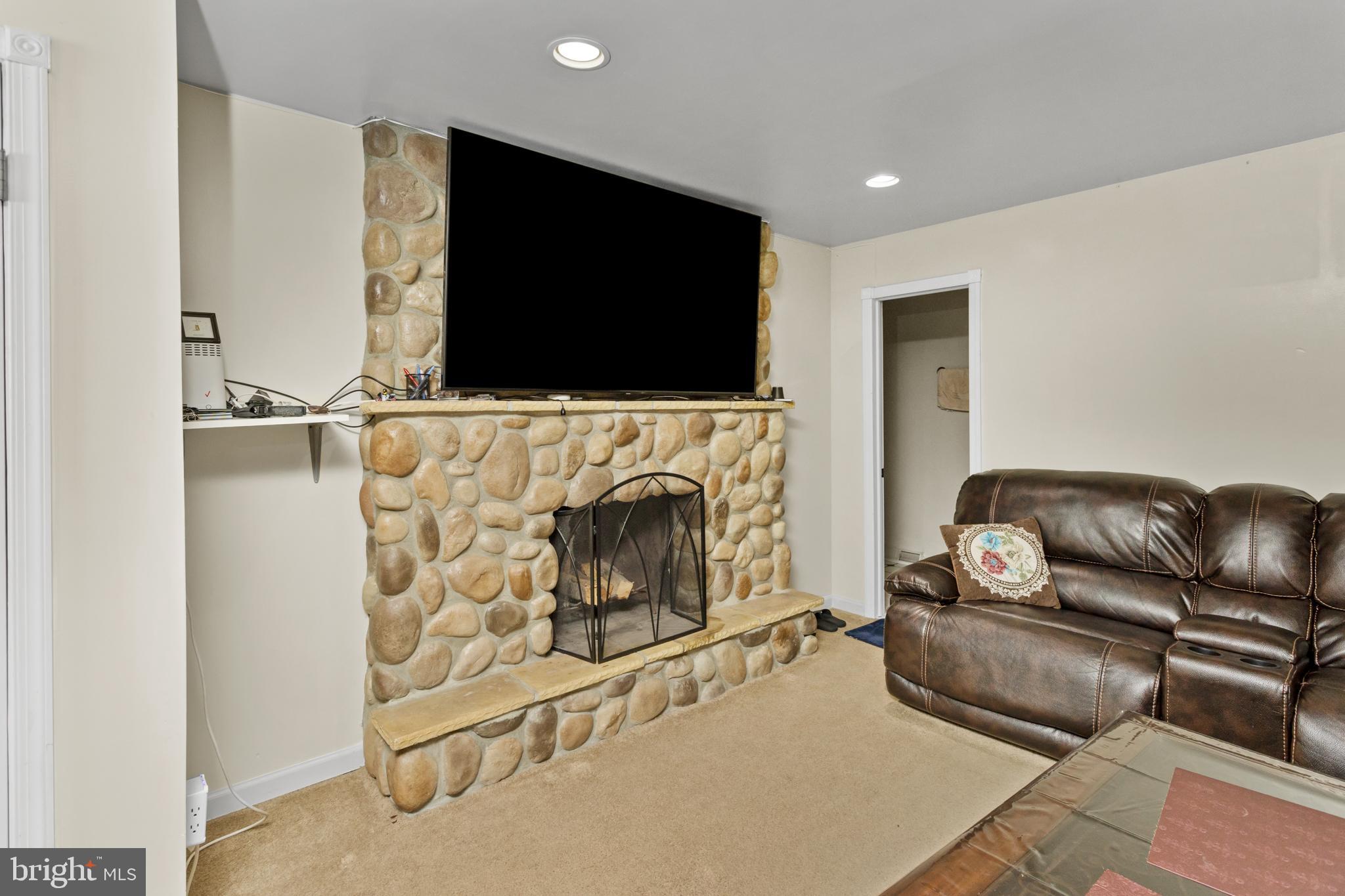 59 Bordentown Chesterfield Road Chesterfield, NJ 08515 - Photo 12 of 50 a living room with furniture and a flat screen tv