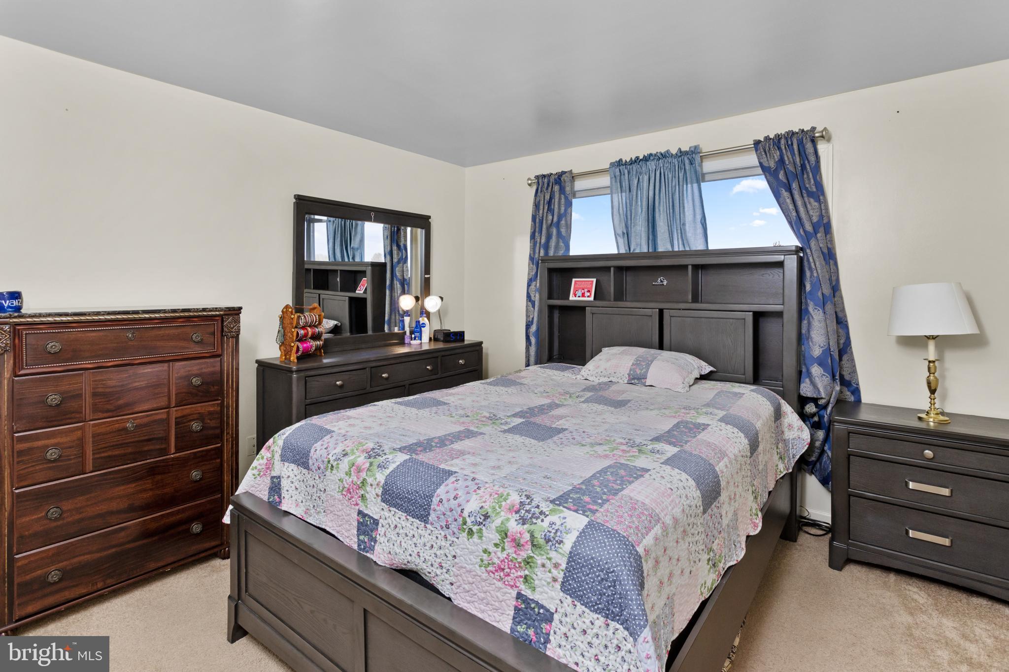 59 Bordentown Chesterfield Road Chesterfield, NJ 08515 - Photo 25 of 50 a bedroom with a bed and a dresser