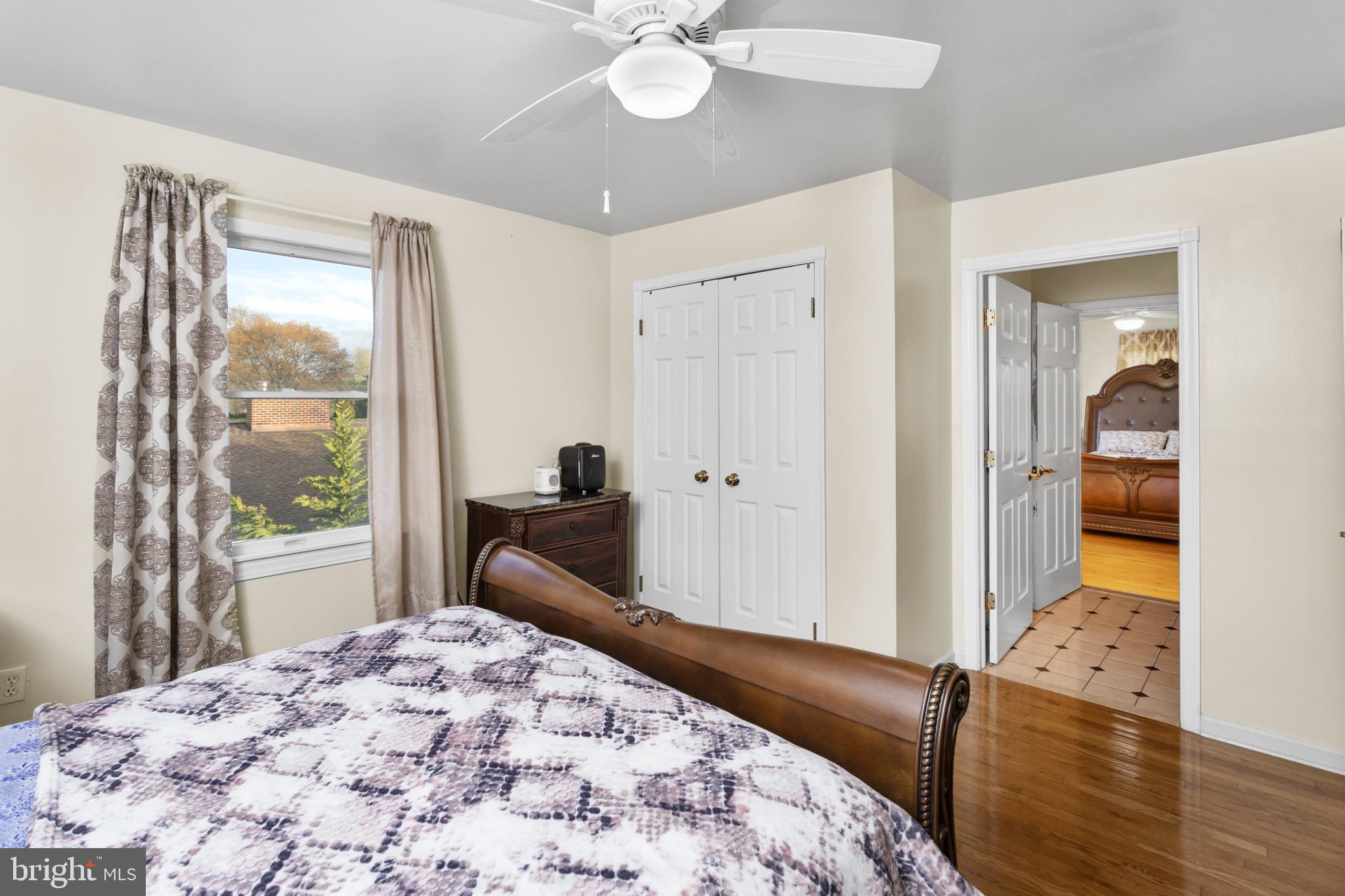 59 Bordentown Chesterfield Road Chesterfield, NJ 08515 - Photo 35 of 50 a bedroom with a bed and a chandelier