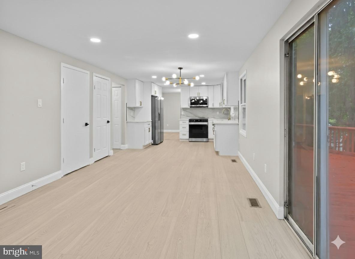 3317 Grayvine Lane Bowie, MD 20721 - Photo 12 of 36 a view of a kitchen with a sink and cabinet area