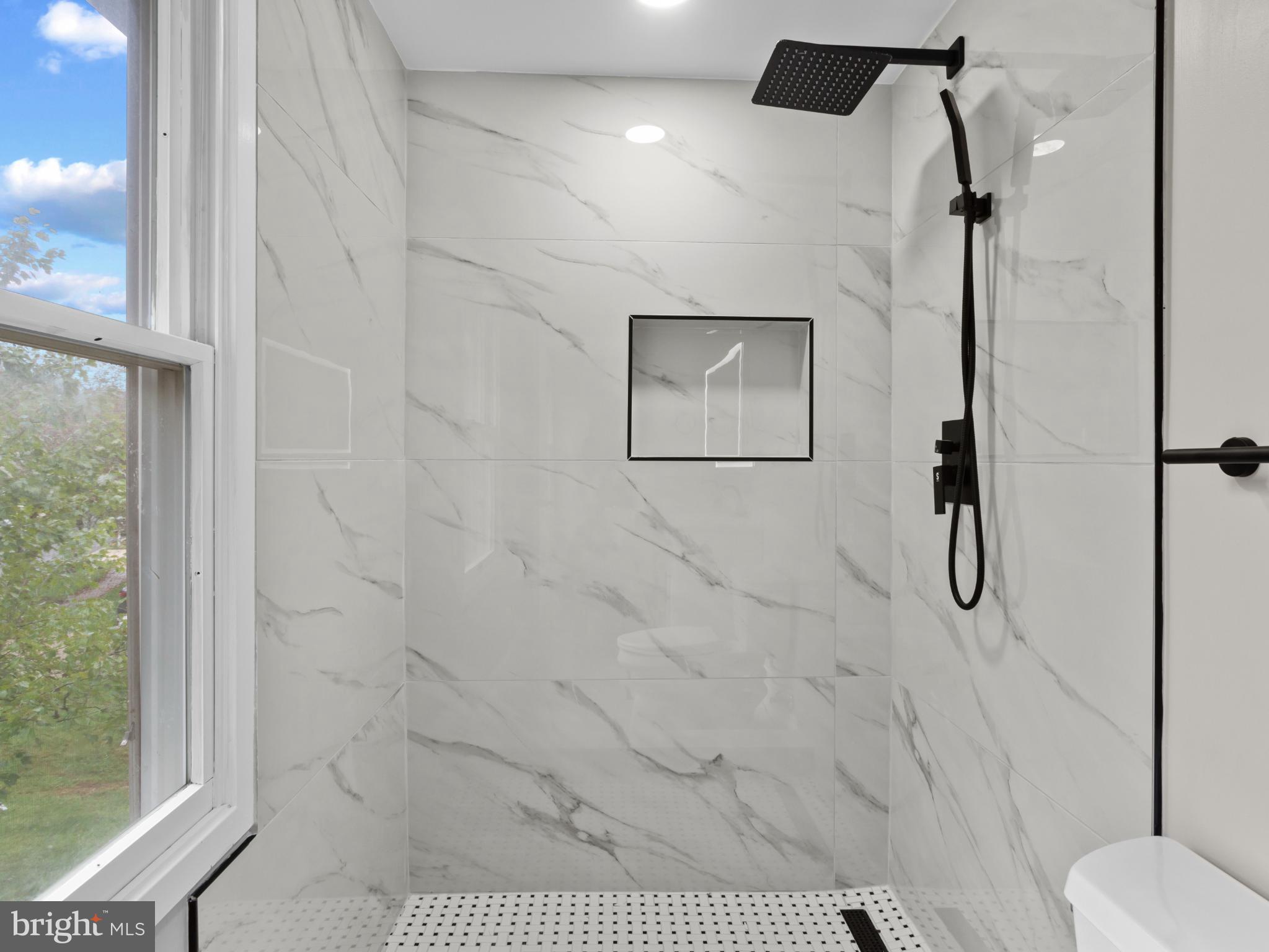 3317 Grayvine Lane Bowie, MD 20721 - Photo 17 of 36 a bathroom with a shower