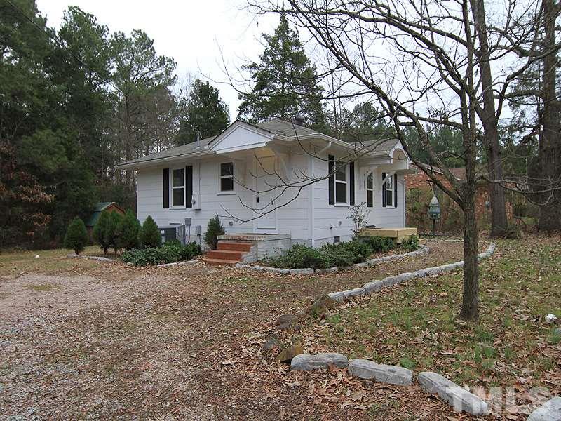 1027 Carpenter Fletcher Road Durham, NC 27713 - Photo 2 of 12 Another view showing side of home