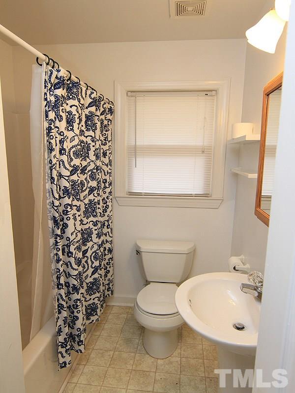 1027 Carpenter Fletcher Road Durham, NC 27713 - Photo 8 of 12 Bathroom has been updated with new fixtures