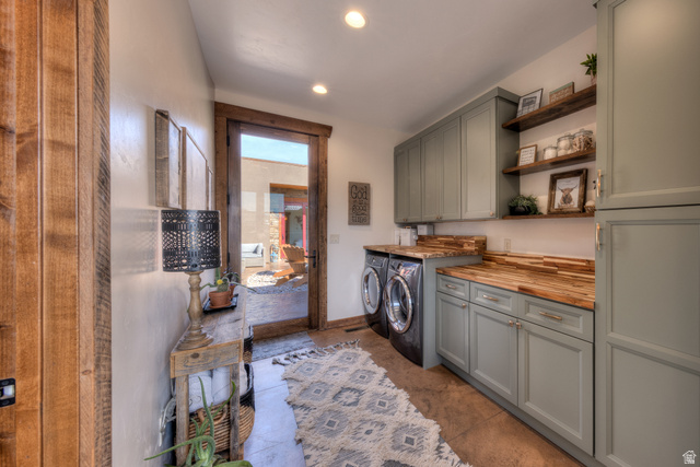 4173 Shadowfax Run, Unit 5 Moab, UT 84532 - Photo 32 of 41 Laundry room featuring cabinet storage, shelves and butcherblock folding counter