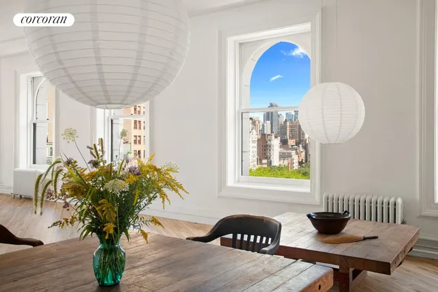 a living room with furniture or couch and a wooden floor