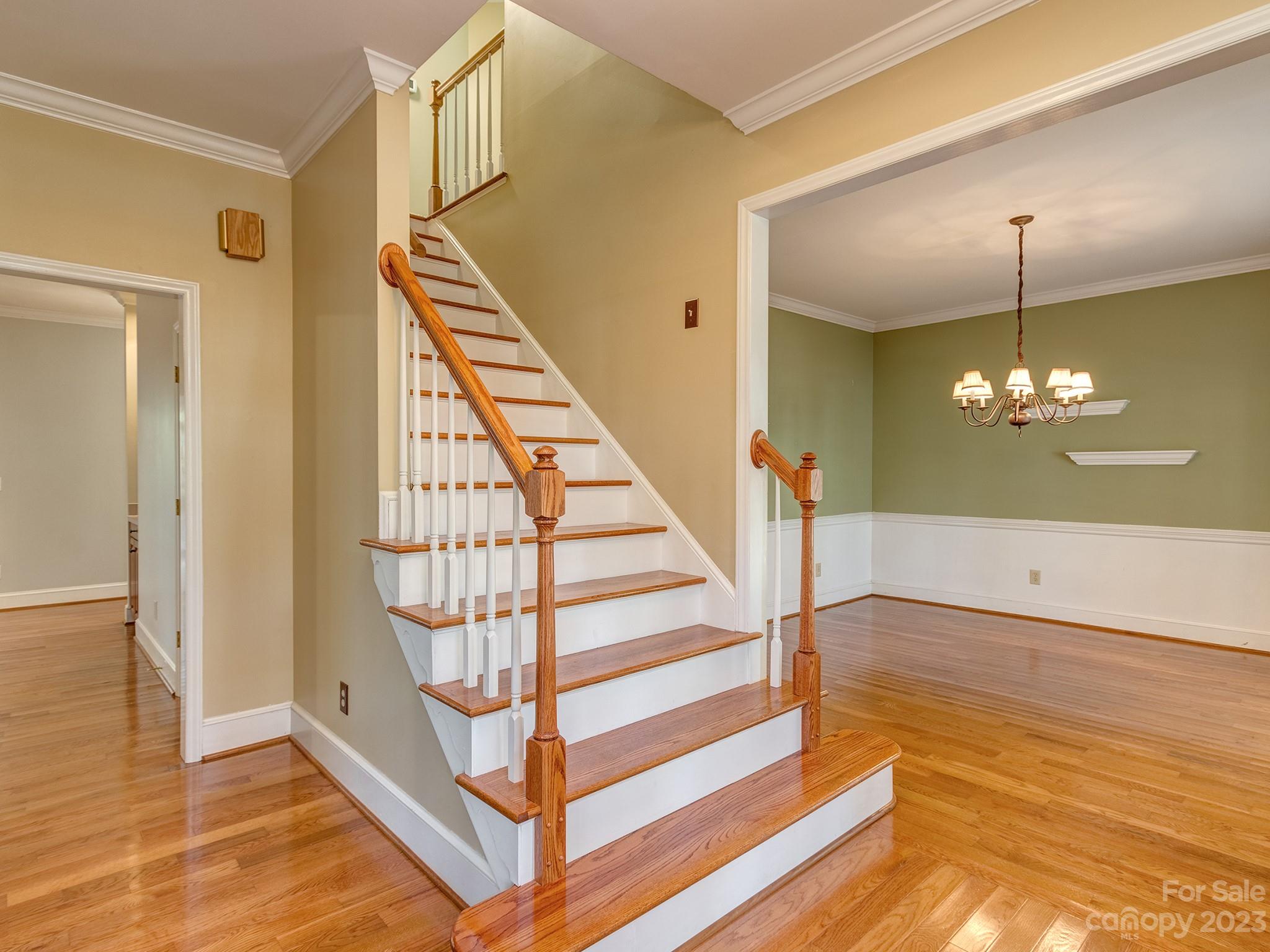 3301 Carnegie Lane Mint Hill, NC 28105 - Photo 11 of 34 a view of a livingroom with wooden floor and staircase