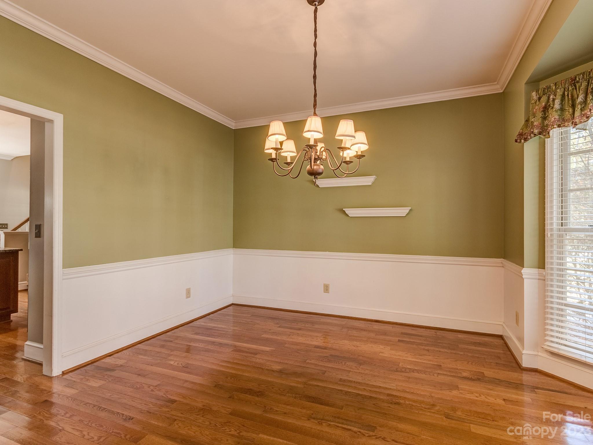 3301 Carnegie Lane Mint Hill, NC 28105 - Photo 17 of 34 a view of room with window and wooden floor